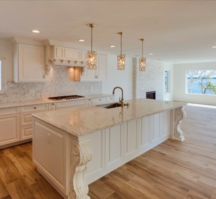 white kitchen with a bayside view